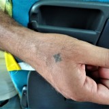 Крест-наколка у коптских христиан означает готовность умереть за веру